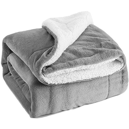 Ultra-soft Sherpa Lamb Blanket. Reversible fleece & sherpa design for all-season warmth. Perfect for bed, sofa & travel.